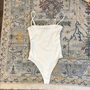 Show Me Your MuMu White Scoop Neck Ribbed Bodysuit